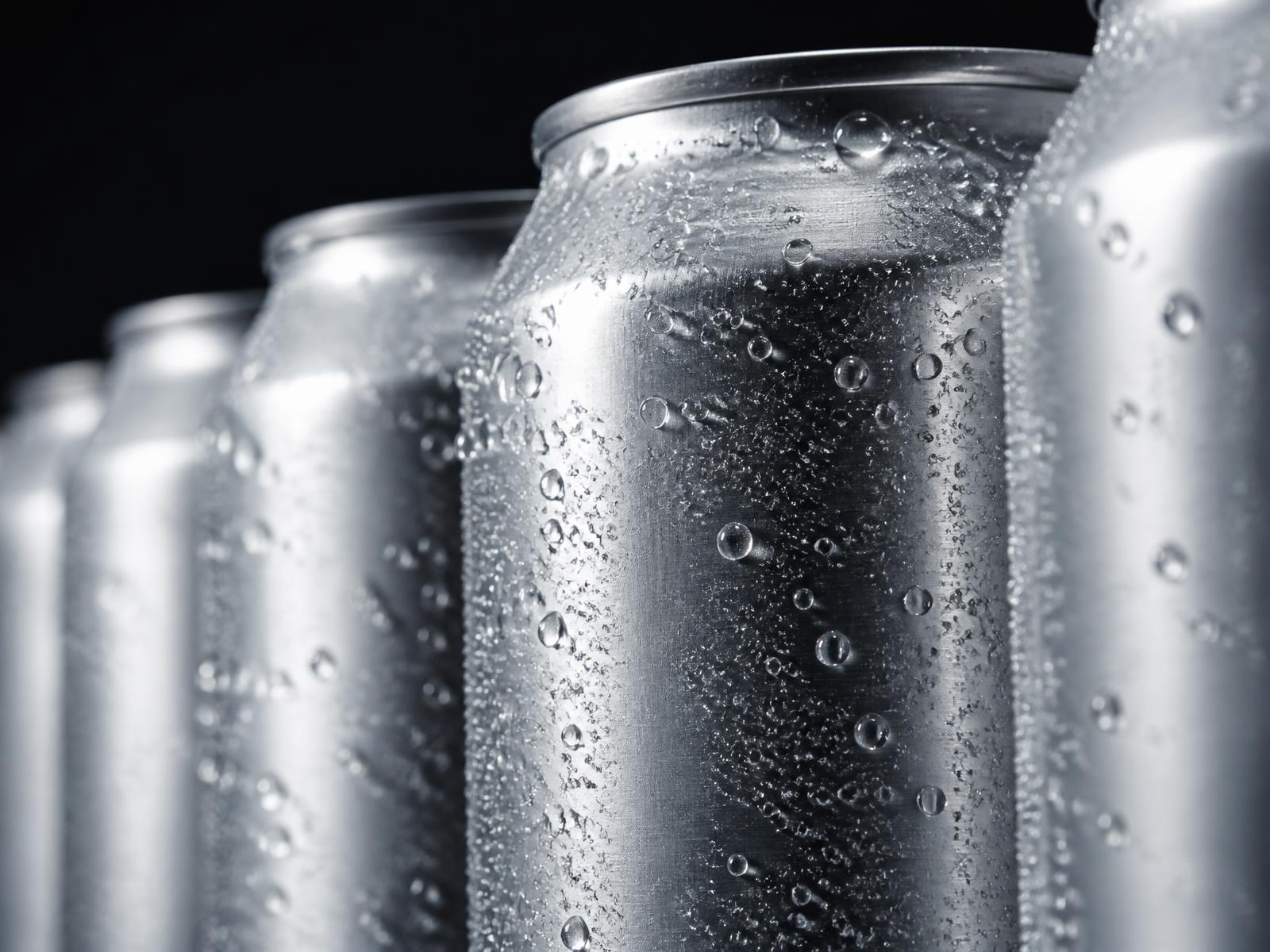 Macro detail of chilled aluminum cans with condensation